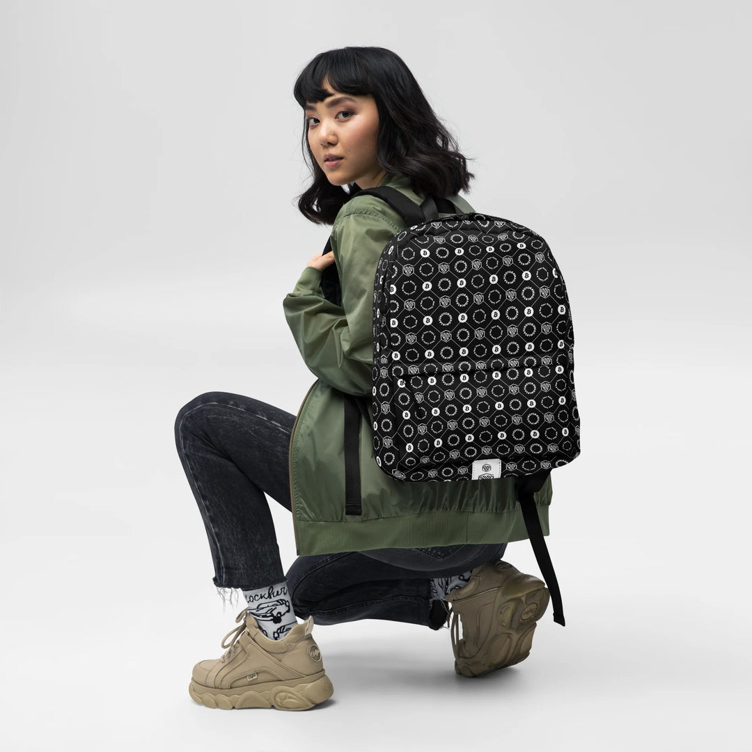 HODL Backpack "First Edition Black" front over shoulder black hair women